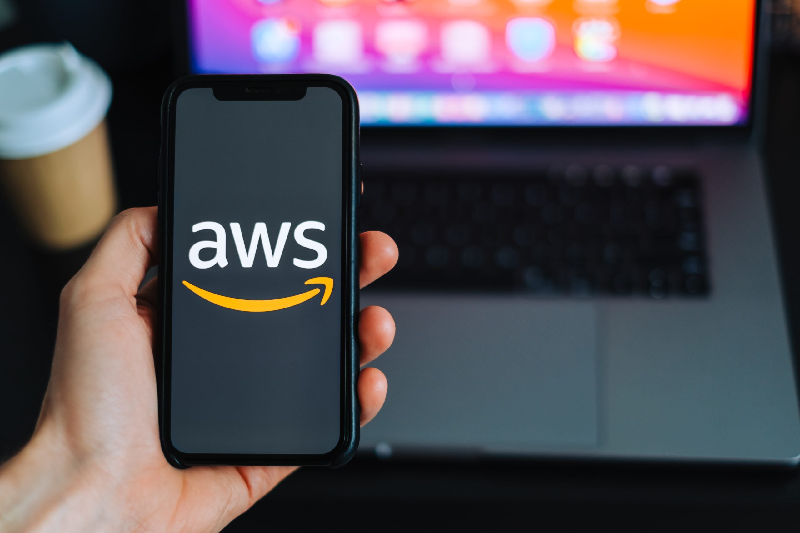 Amazon Web Services logo on the smartphone screen. Rostov-on-Don